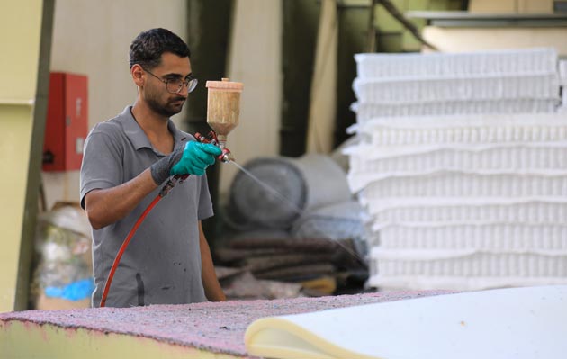 Processing of mattress layers